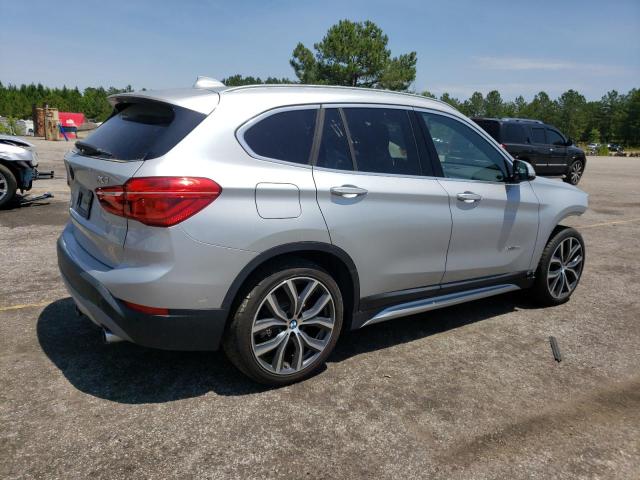 Photo 3 from auction – 2017 BMW X1 XDRIVE2 with VIN WBXHT3C31H5F76069