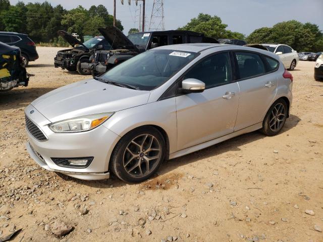 FORD FOCUS SE 2015 with VIN 1FADP3K2XFL214486 - Photo from auction