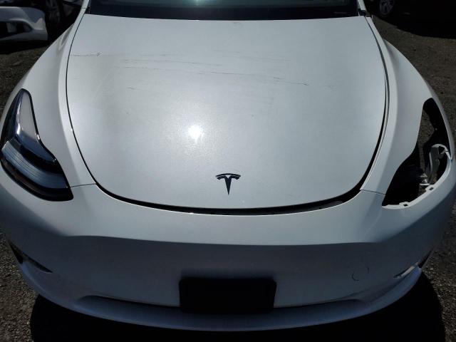 Photo 11 from auction – 2023 TESLA MODEL Y with VIN 7SAYGDEE7PA089605