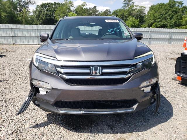 Photo 5 from auction – 2016 HONDA PILOT TOUR with VIN 5FNYF5H95GB032925