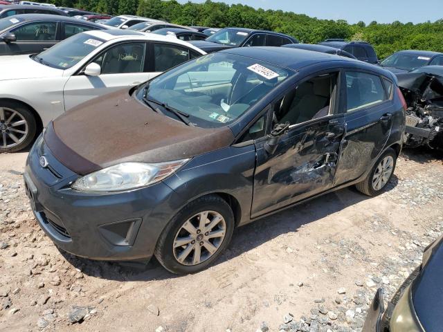 FORD FIESTA SE 2011 with VIN 3FADP4EJ3BM121410 - Photo from auction