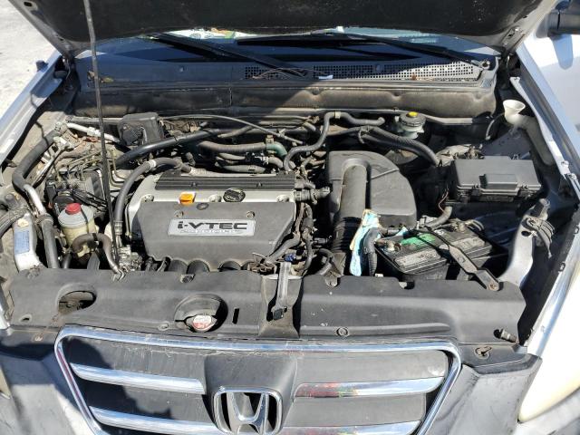 Photo 12 from auction – 2005 HONDA CR-V LX with VIN JHLRD78545C064572