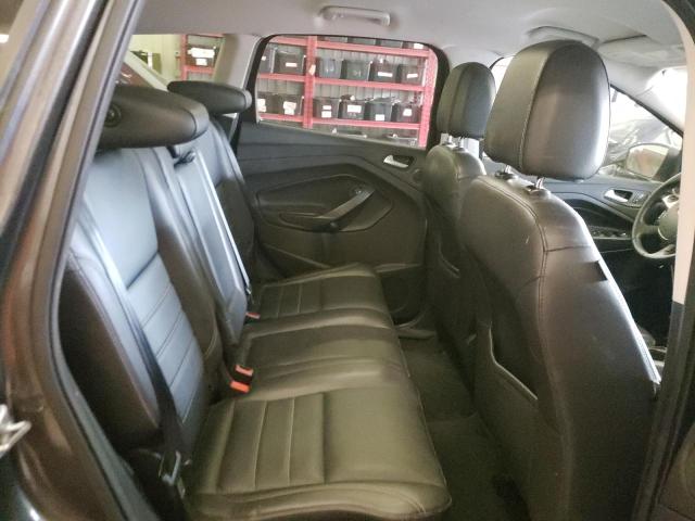 Foto 11 de la subasta – 2016 FORD ESCAPE SE con VIN 1FMCU9G95GUC11669