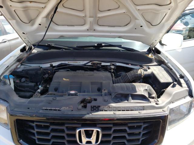 Photo 11 from auction – 2014 HONDA RIDGELINE with VIN 5FPYK1F63EB006129