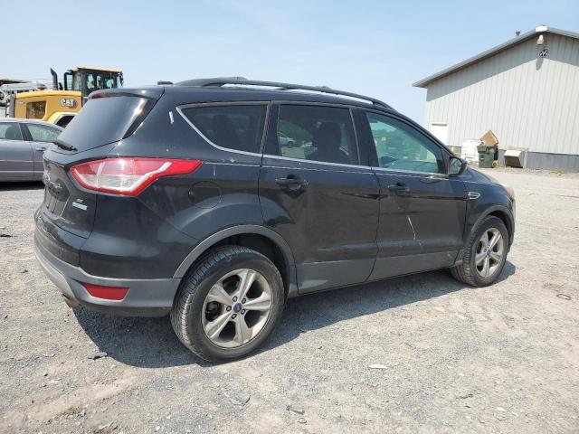 Photo 3 from auction – 2014 FORD ESCAPE SE with VIN 1FMCU0GX8EUA02188