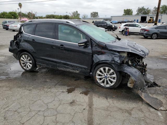 Photo 4 from auction – 2018 FORD ESCAPE TIT with VIN 1FMCU0J97JUB13951