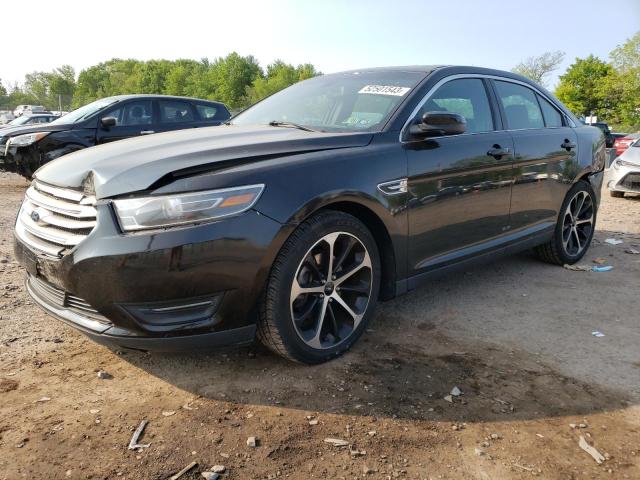 FORD TAURUS SEL 2015 with VIN 1FAHP2E8XFG128552 - Photo from auction