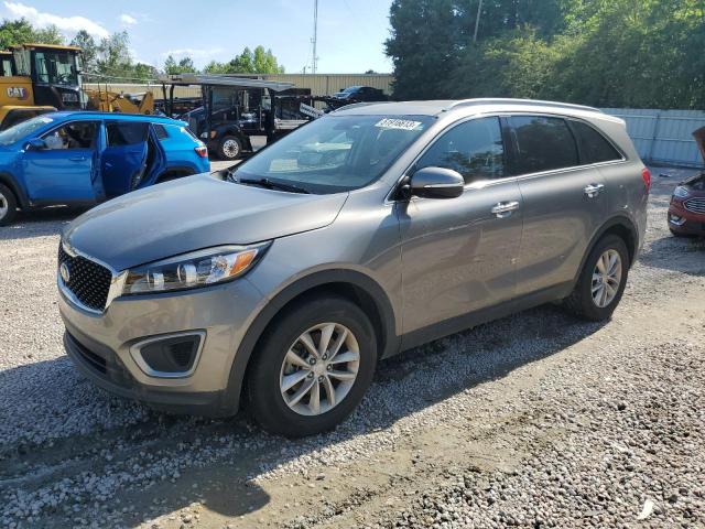 KIA SORENTO LX 2016 with VIN 5XYPG4A34GG176015 - Photo from auction