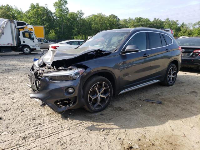 BMW X1 XDRIVE2 2017 with VIN WBXHT3C3XH5F69203 - Photo from auction