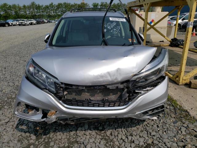 Photo 5 from auction – 2015 HONDA CR-V EXL with VIN 2HKRM4H77FH668121