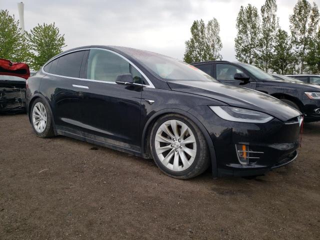 Photo 4 from auction – 2017 TESLA MODEL X with VIN 5YJXCBE2XHF048937