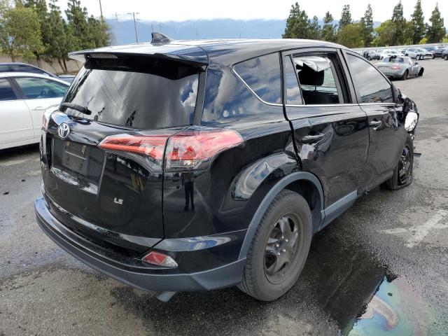 Photo 3 from auction – 2018 TOYOTA RAV4 LE with VIN 2T3ZFREV5JW506595