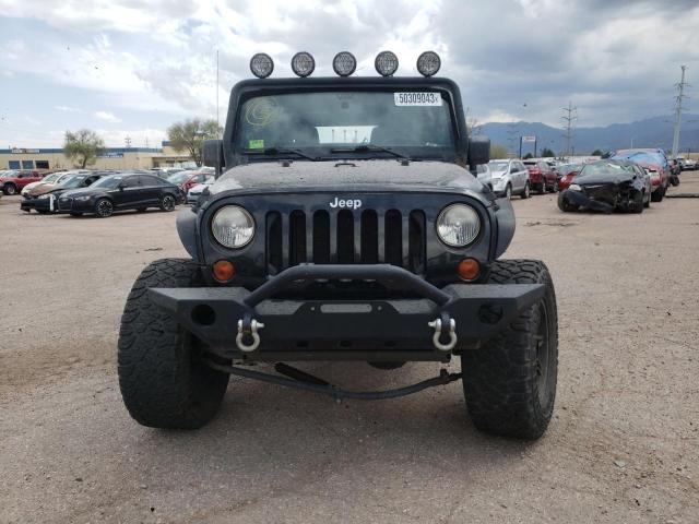 Foto 5 de la subasta – 2011 JEEP WRANGLER U con VIN 1J4BA5H16BL522336