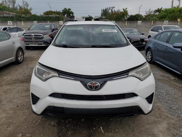 Photo 5 from auction – 2018 TOYOTA RAV4 LE with VIN 2T3ZFREV4JW421070