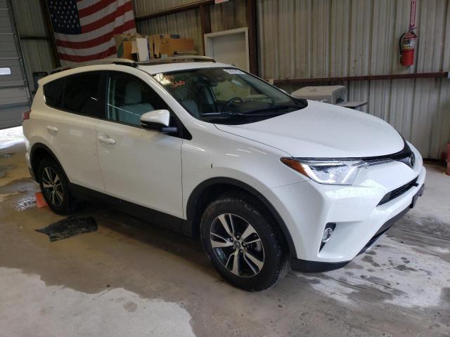Photo 4 from auction – 2017 TOYOTA RAV4 XLE with VIN JTMRFREV4HJ172732
