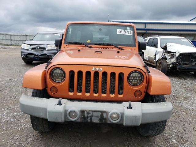 Photo 5 from auction – 2011 JEEP WRANGLER U with VIN 1J4BA5H11BL592861