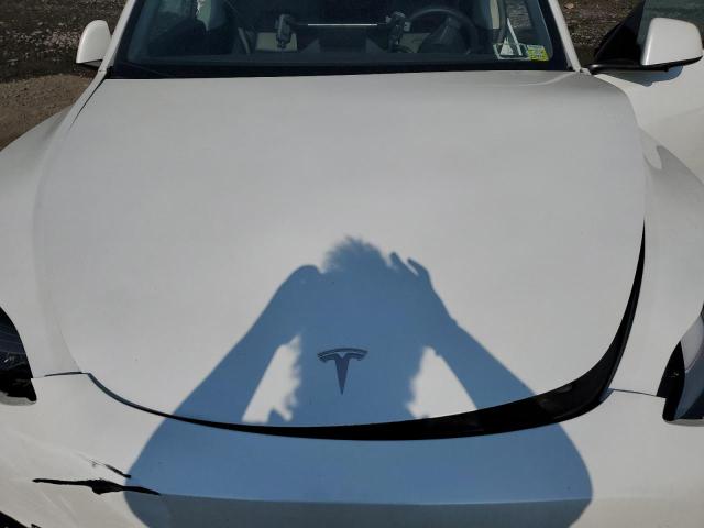Photo 11 from auction – 2021 TESLA MODEL Y with VIN 5YJYGDEEXMF079999