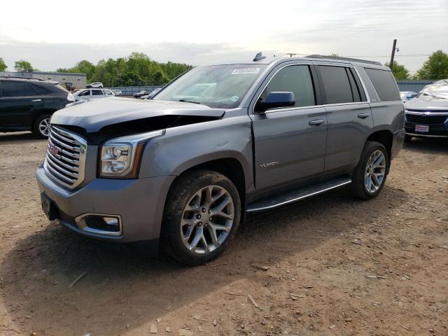 GMC YUKON SLE 2020 with VIN 1GKS2AKC8LR122061 - Photo from auction