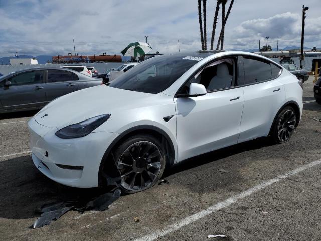 TESLA MODEL Y 2023 with VIN 7SAYGAEE9PF645950 - Photo from auction