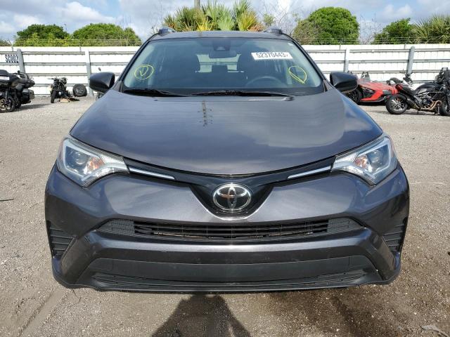 Photo 5 from auction – 2018 TOYOTA RAV4 LE with VIN JTMZFREV8JJ211568