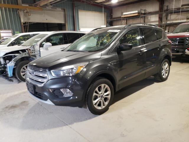 FORD ESCAPE SE 2018 with VIN 1FMCU9GD9JUB37958 - Photo from auction