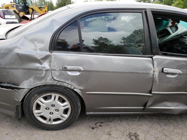 Photo 10 from auction – 2004 HONDA CIVIC LX with VIN 2HGES16524H623759