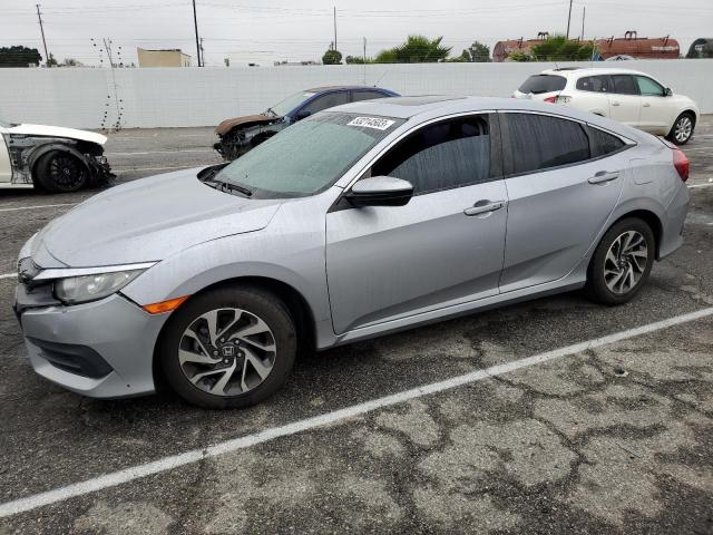 HONDA CIVIC EX 2017 with VIN 2HGFC2F77HH570278 - Photo from auction