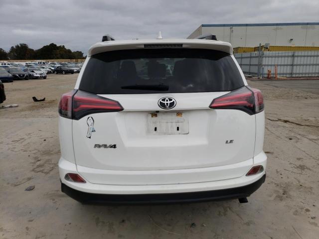 Photo 6 from auction – 2018 TOYOTA RAV4 LE with VIN JTMZFREV4JJ150283