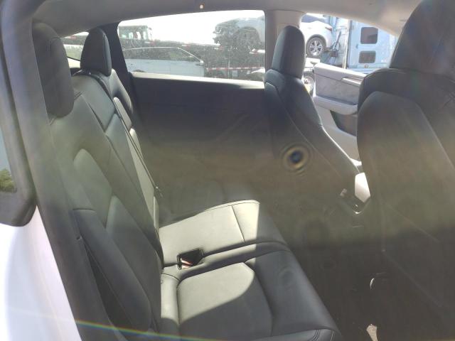 Photo 11 from auction – 2023 TESLA MODEL Y with VIN 7SAYGAEE4PF598195