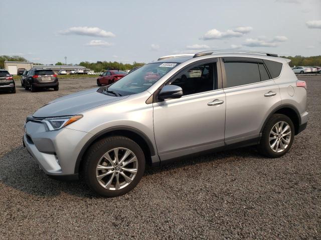 TOYOTA RAV4 LIMIT 2018 with VIN 2T3DFREV3JW712394 - Photo from auction