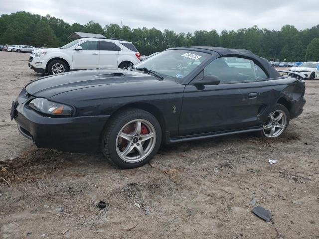 FORD MUSTANG CO 1998 with VIN 1FAFP46V4WF164377 - Photo from auction
