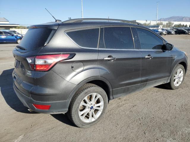 Photo 3 from auction – 2018 FORD ESCAPE SE with VIN 1FMCU0GD0JUD22864
