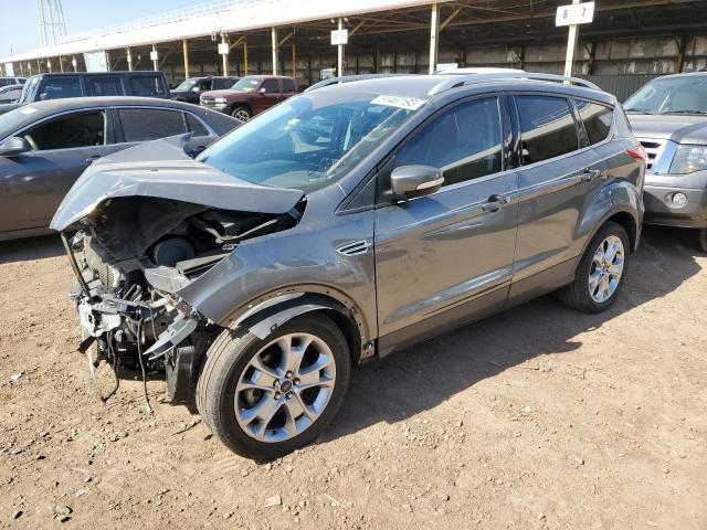 FORD ESCAPE TIT 2014 with VIN 1FMCU0JX9EUE13706 - Photo from auction
