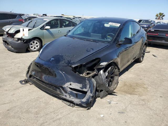 TESLA MODEL Y 2023 with VIN 7SAYGAEE4PF716195 - Photo from auction
