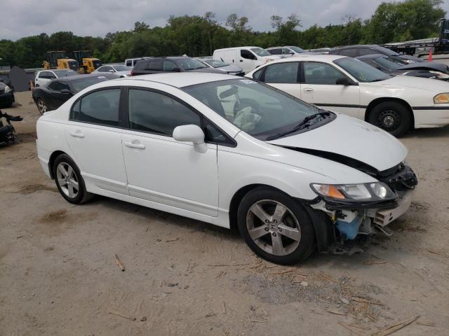 Photo 4 from auction – 2011 HONDA CIVIC LX-S with VIN 19XFA1F69BE020606