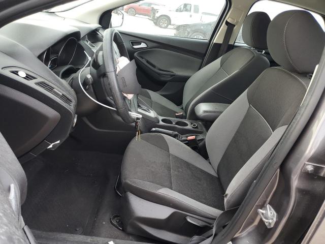 Foto 7 de la subasta – 2014 FORD FOCUS SE con VIN 1FADP3F21EL372322