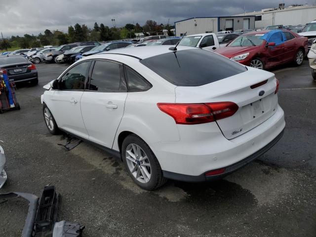 Photo 2 from auction – 2015 FORD FOCUS SE with VIN 1FADP3F28FL358449