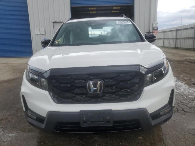 Photo 5 from auction – 2023 HONDA PASSPORT E with VIN 5FNYF8H03PB010585