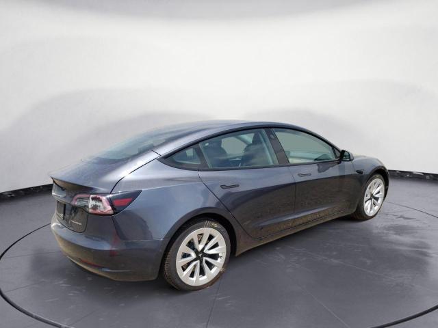 Photo 3 from auction – 2022 TESLA MODEL 3 with VIN 5YJ3E1EB3NF192652