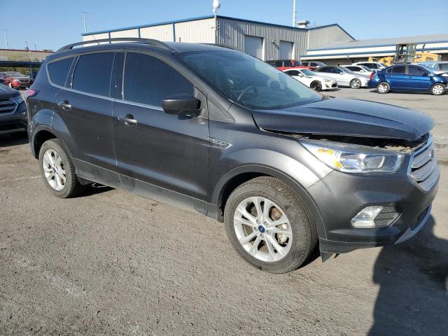 Photo 4 from auction – 2018 FORD ESCAPE SE with VIN 1FMCU0GD0JUD22864