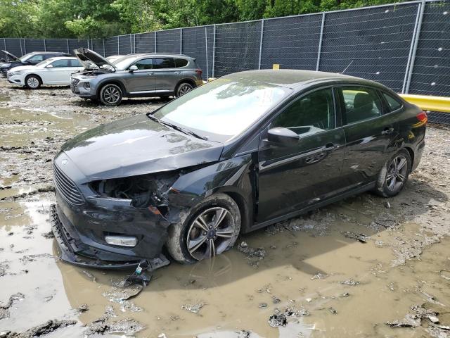 FORD FOCUS SE 2018 with VIN 1FADP3FE4JL332336 - Photo from auction