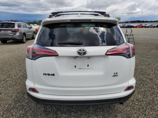 Photo 6 from auction – 2017 TOYOTA RAV4 LE with VIN JTMBFREV4HJ114556