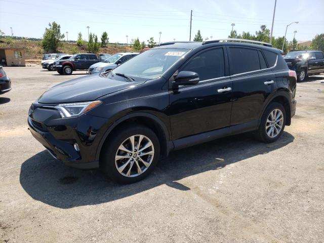 TOYOTA RAV4 LIMIT 2018 with VIN 2T3YFREV6JW448024 - Photo from auction