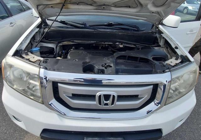 Photo 7 from auction – 2011 HONDA PILOT EX with VIN 5FNYF4H4XBB048156