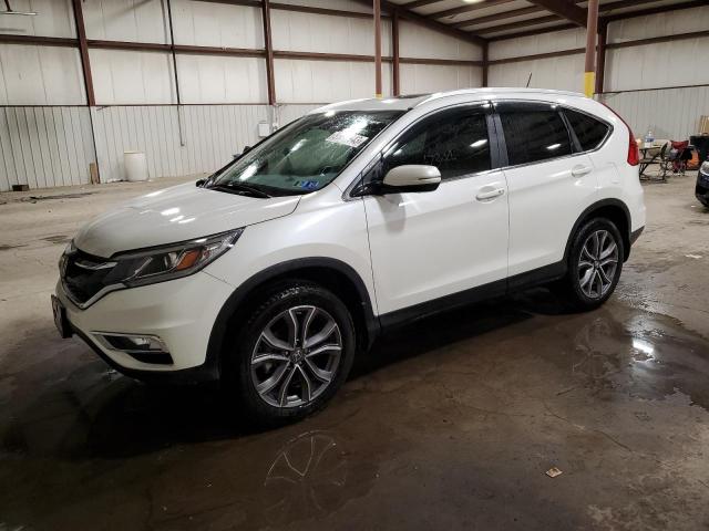 HONDA CR-V TOURI 2016 with VIN 5J6RM3H96GL010857 - Photo from auction