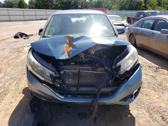 Photo 5 from auction – 2015 HONDA CR-V LX with VIN 2HKRM3H33FH509443