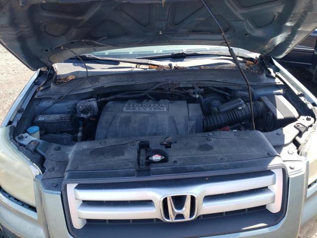 Photo 11 from auction – 2006 HONDA PILOT EX with VIN 5FNYF285X6B038343