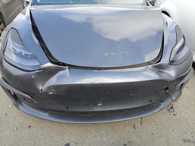 Photo 11 from auction – 2018 TESLA MODEL 3 with VIN 5YJ3E1EA4JF024035