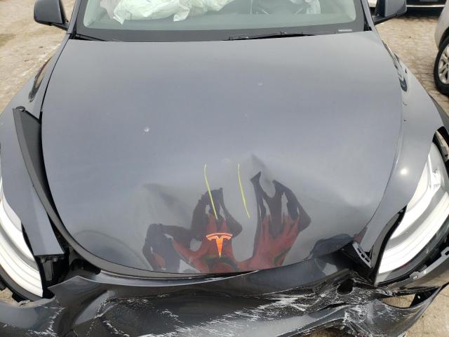 Photo 12 from auction – 2023 TESLA MODEL Y with VIN 7SAYGDEE8PA034659