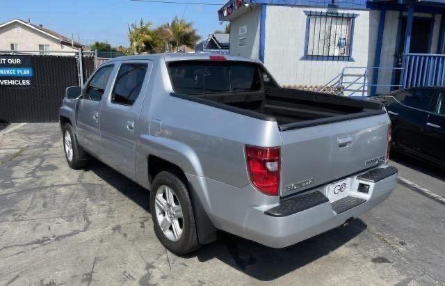 Photo 3 from auction – 2011 HONDA RIDGELINE with VIN 5FPYK1F52BB005590